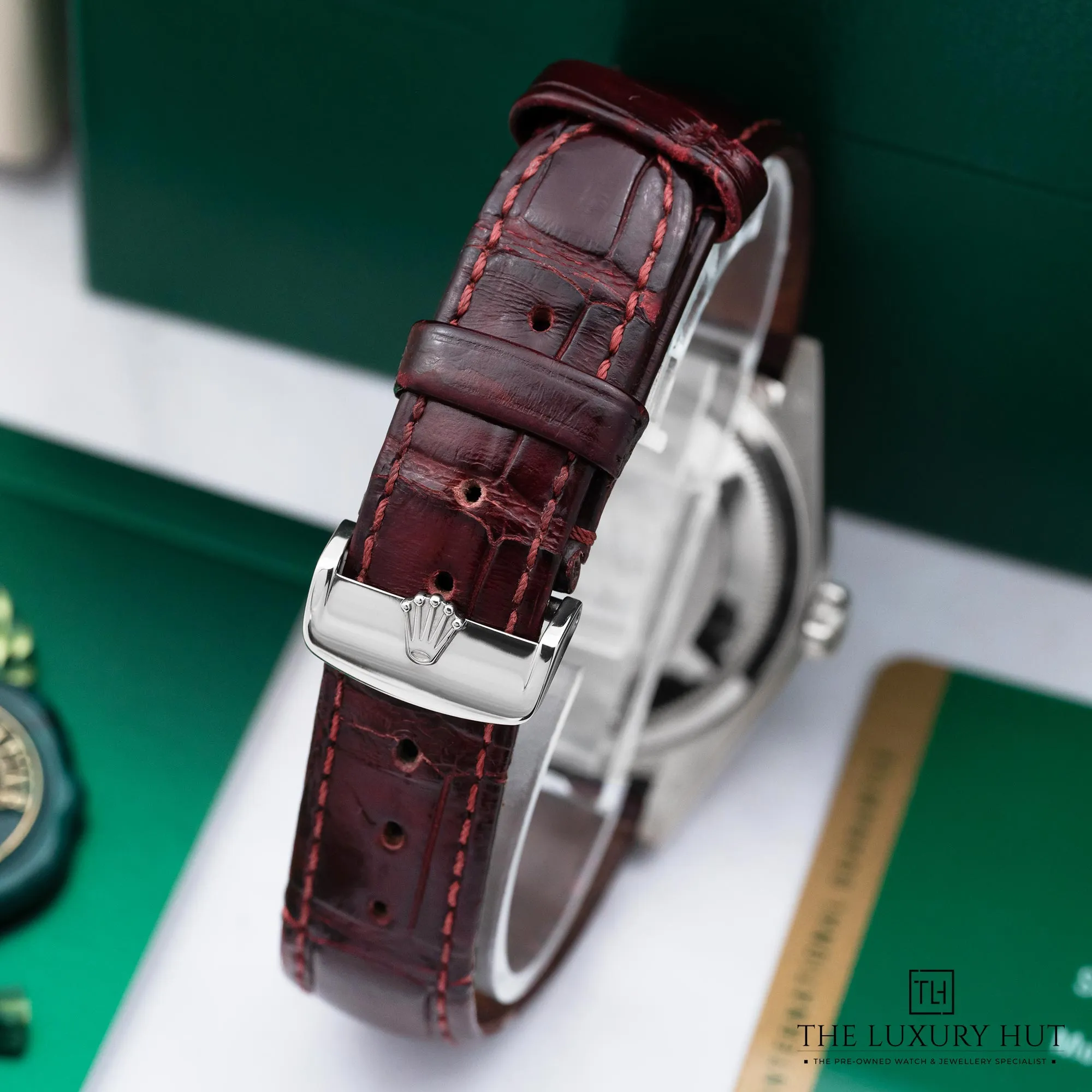 2025/10/5844ada7-7f24-4dad-a03f-3662a8577a67Rolex_Day-Date_White_Gold_36_Cherry_Dial_New_39299-d.webp