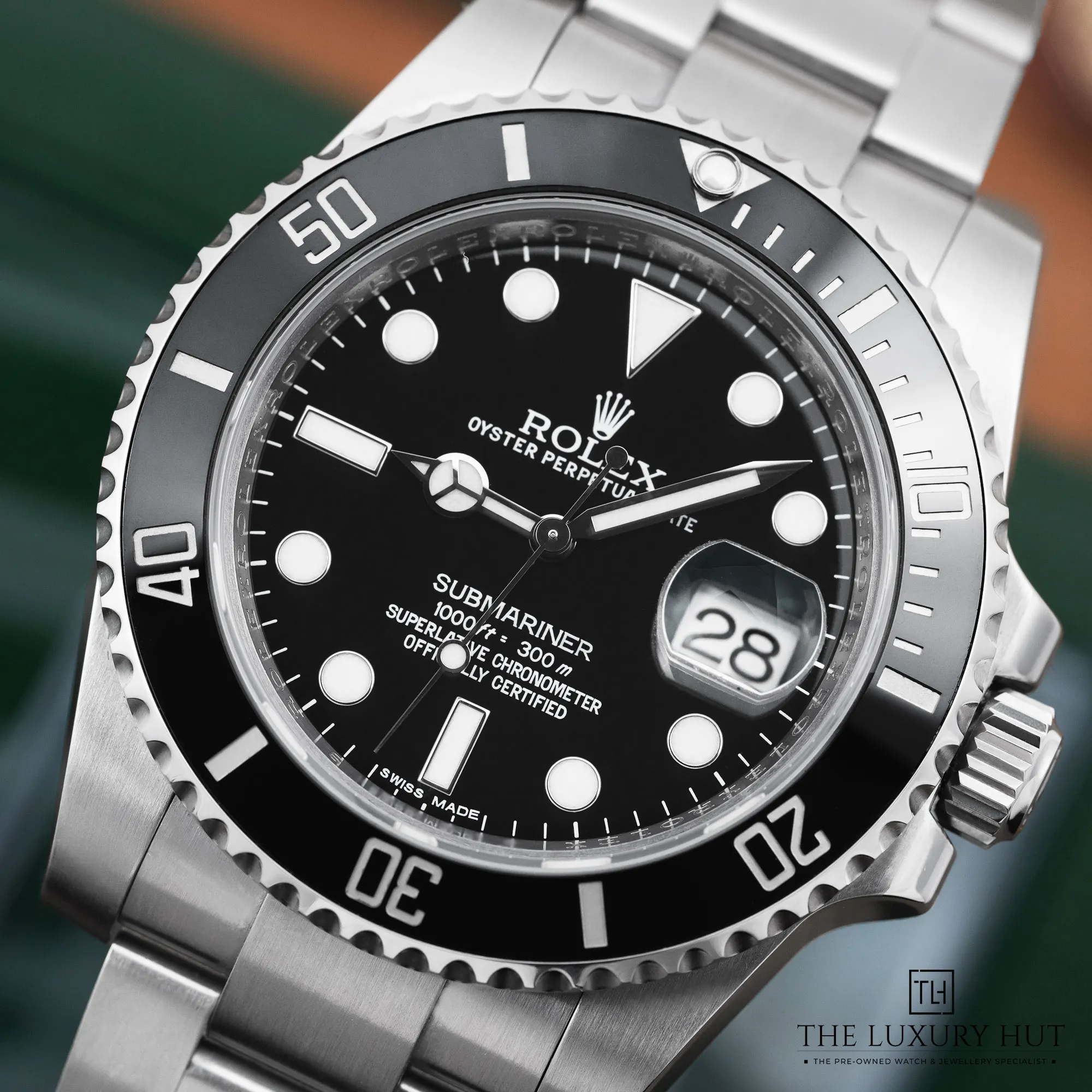 2026/02/fd671557-03bf-4802-a9b2-c94e7a930309Rolex_Submariner_Date_Steel_40mm_Black_52662-e.jpg.webp