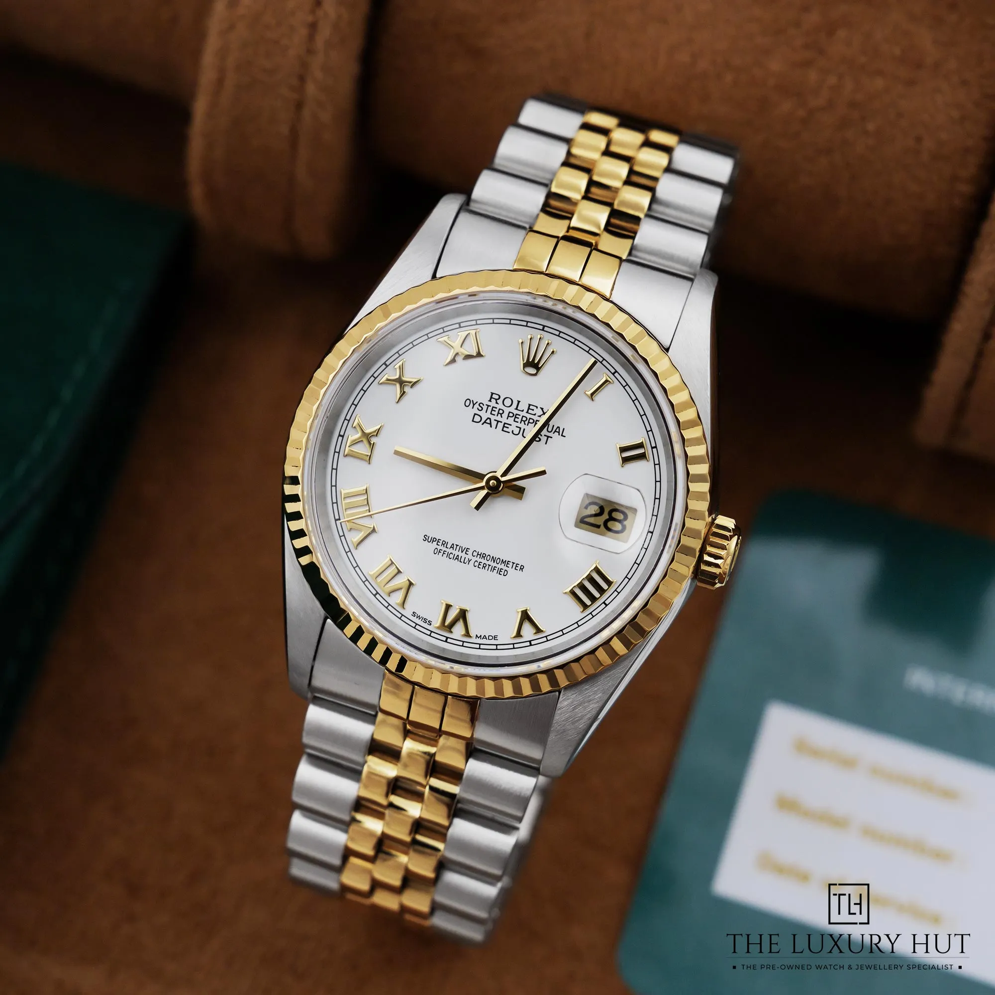 2026/06/77b5633e-c852-456a-a9c8-329113cc9fa8Rolex_Datejust_36mm_White_Roman_Dial_52979-b.jpg.webp