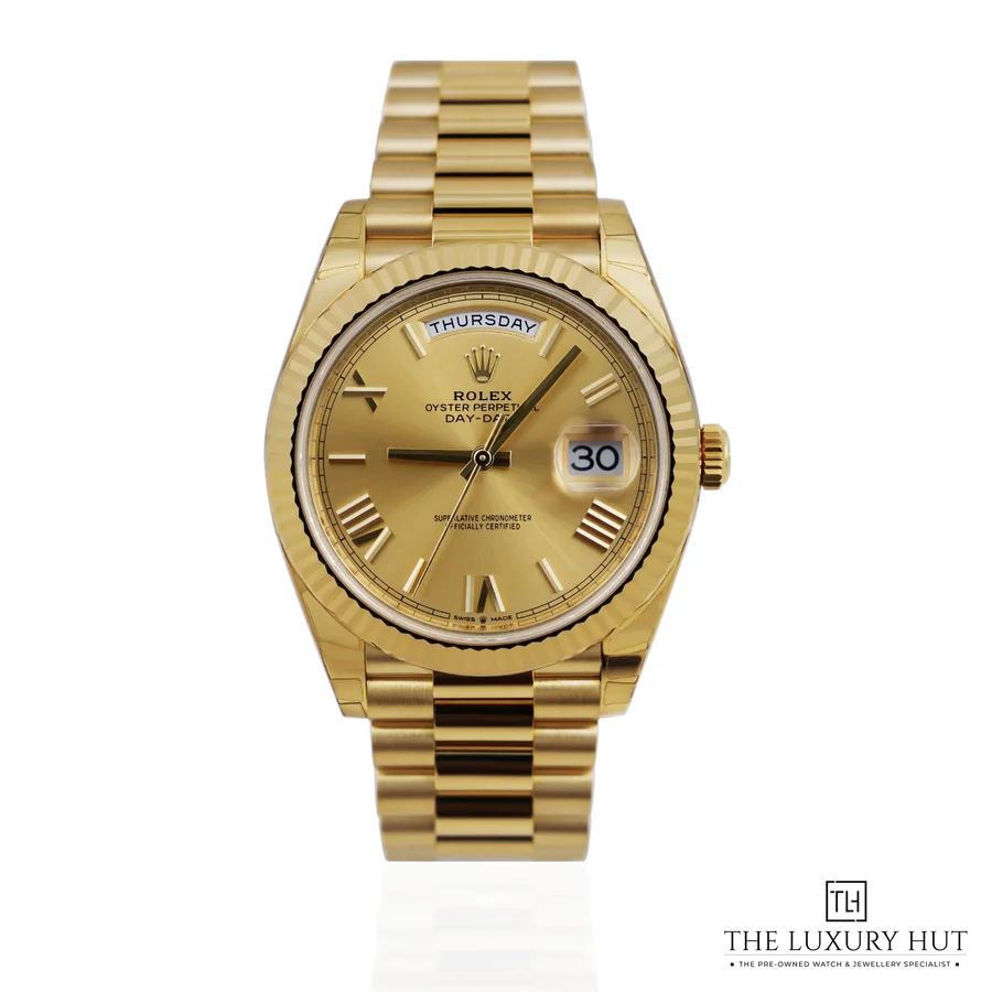 Rolex Day Date 40 Gold Champagne Roman 228238